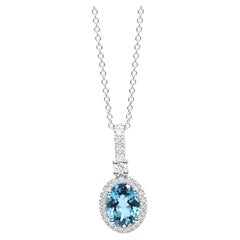 Georgios Collection 18 Karat White Gold Oval Blue Topaz and Diamond Halo Pendant