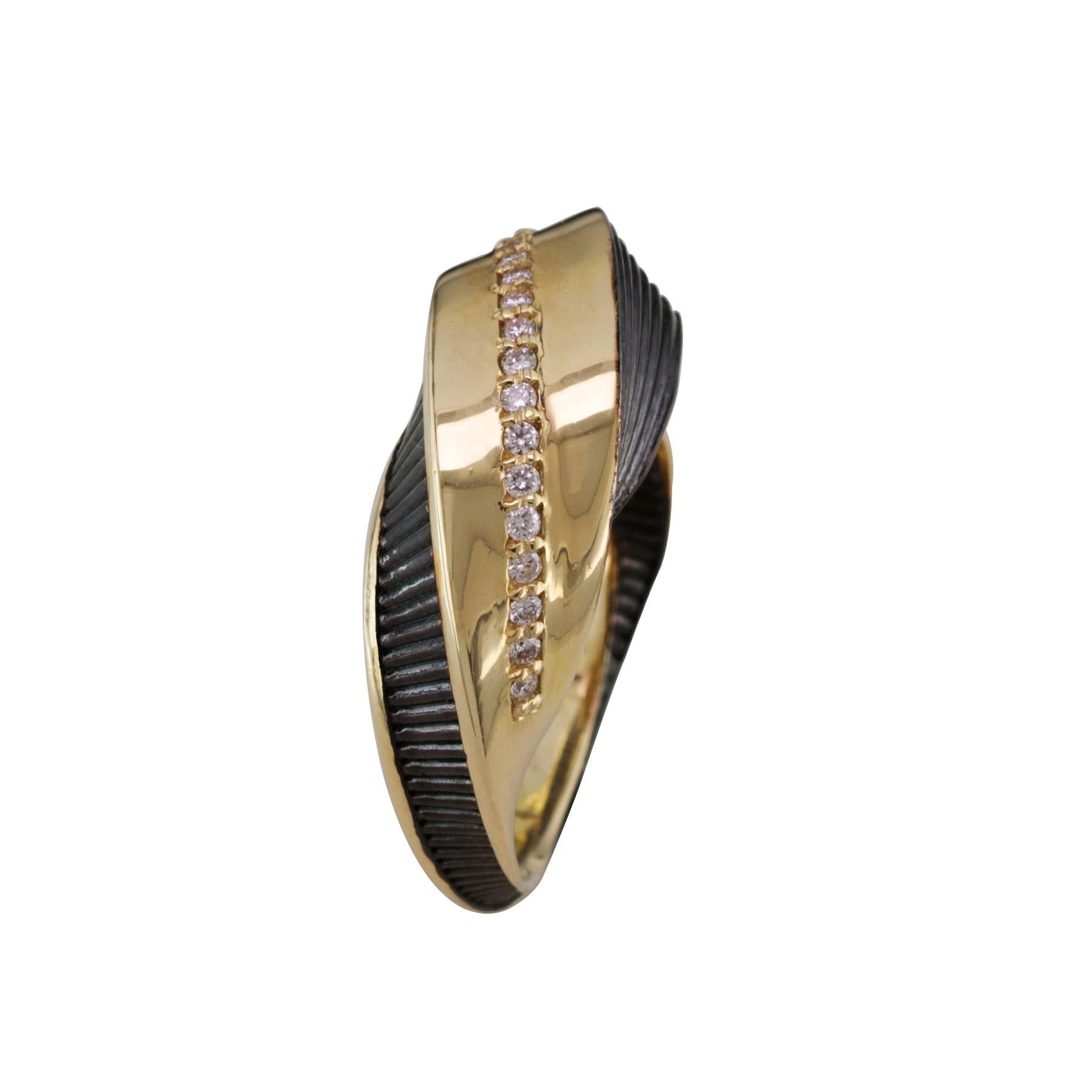 S. Georgios 18 Karat Yellow Gold Diamond Ring which is Designed with Architectural precision. 
The stunning ring is unique as a design and features White Brilliant cut Diamonds total weight of 0,20 Carat and Black Rhodium prongs and a background