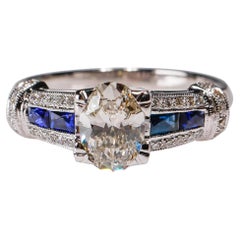 Bague de fiançailles en or blanc 18 carats avec diamant de 1,41 carat et saphir bleu de 0,42 carat