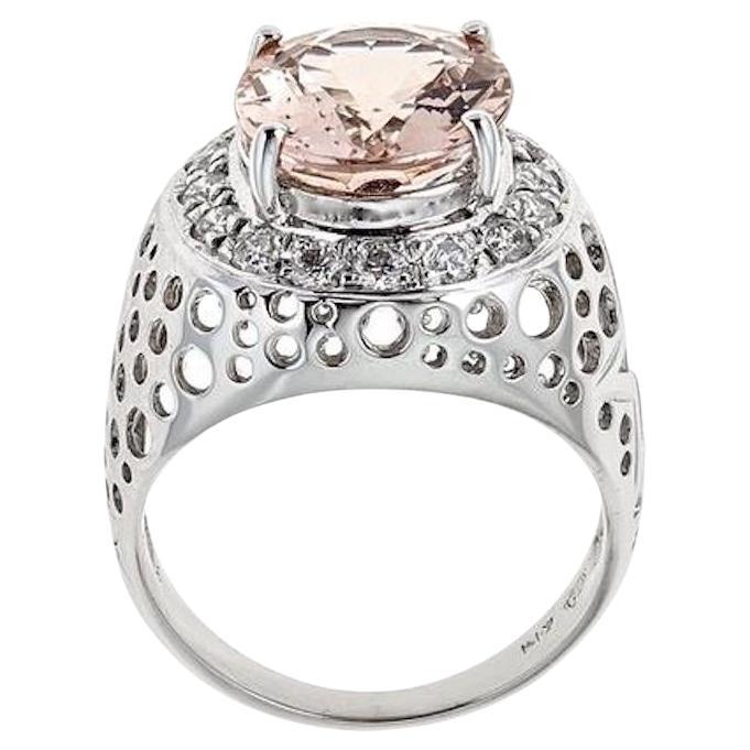 4.47ct Oval Cut Morganite 0.70 ct Diamond Accent Cocktail Ring in 14k White Gold

Crafted in 14k White Gold, this Unique design showcases Pale pink 4.47 TCW oval-shaped Morganite, set in a halo of round mesmerizing diamonds, totaling 0.70 TCW.