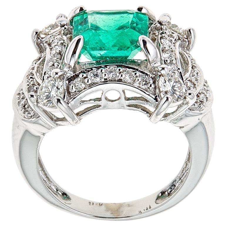 2.65 Carat Emerald and Diamond Cocktail Ring 14 Karat White Gold Jewelry Size 6.5

Pop the question with this gorgeous one of a kind ring. Crafted in 14k POlished White Gold the ring features Vivid Green Emerald encrusted with a set of 1.1 TCW round