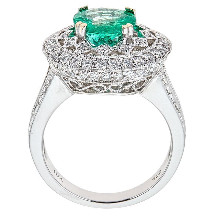 2.0 Carat Emerald Diamond Cocktail Ring 18 Karat White Gold Jewelry Size 7.2

Romance and love are the only words associated with this ring. Crafted in 18k White Gold, it vintage design presents round cut vivid emerald of 2TCW, embellished with a