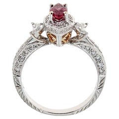 0,60 tcw Rubin im Marquise-Schliff und Diamant-Akzent Verlobungsring 18k Weißgold