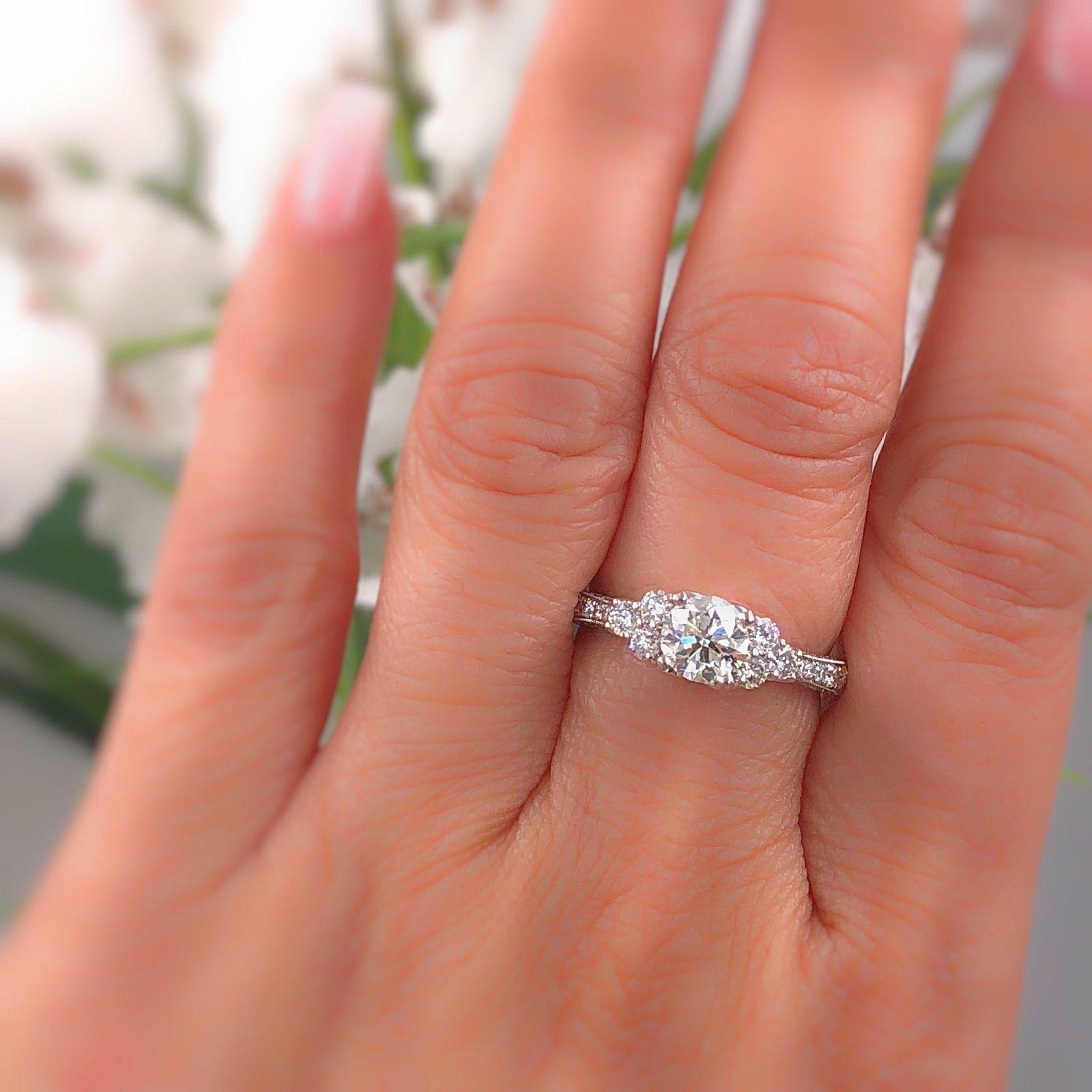 NEIL LANE BRIDAL
Style:  Solitaire with Diamond Accents
Metal:  14k White Gold
Size:  6 - sizable
Total Carat Weight:  1.35 tcw
Diamond Shape:  Round Diamond 0.75 cts I color, I1 clarity
Accent Diamonds Color & Clarity:  6 Round Diamonds 0.30 tcw,