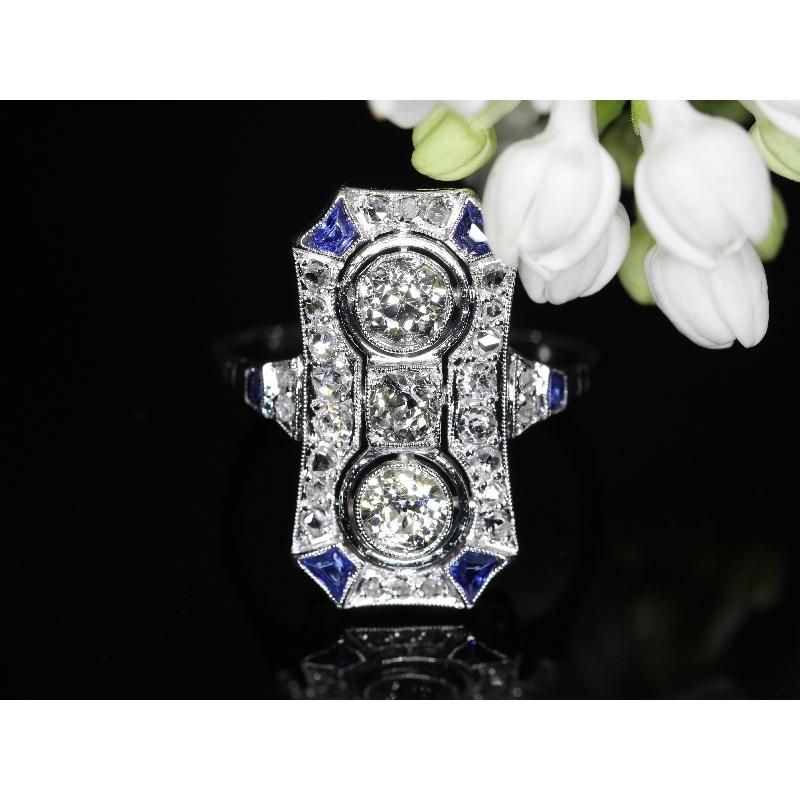 Typical Art Deco Platinum Diamond Engagement Ring For Sale 9
