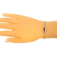Belle Époque Gold and Platinum Bracelet with Diamonds and Sapphires
