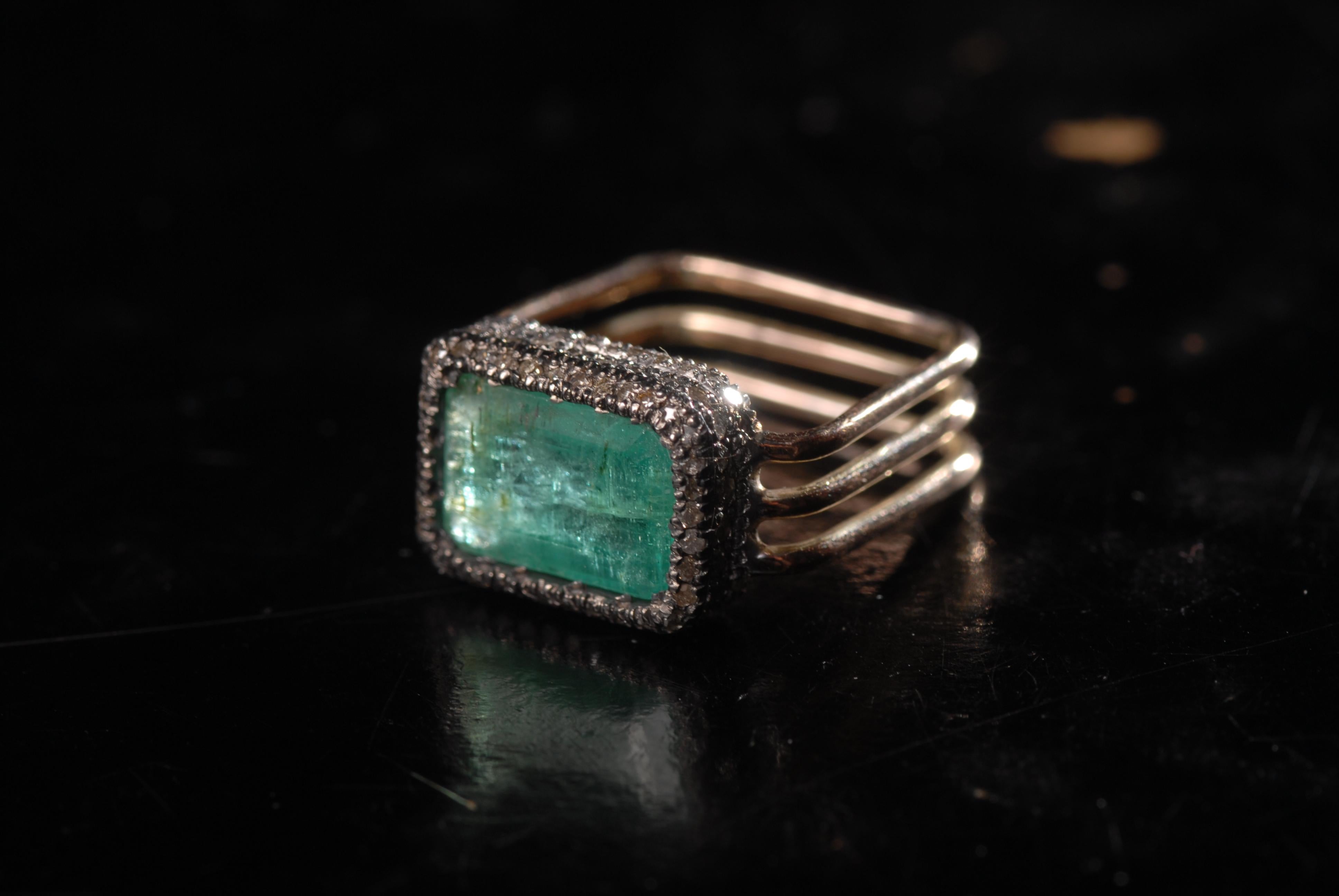 !4 carat gold and silver contemporary ring with rectangular emerald and diamonds