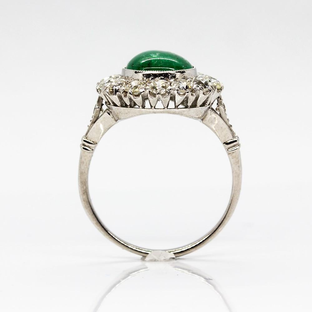 Women's or Men's Platinum Handmade Emerald and Diamonds Halo Ring For Sale