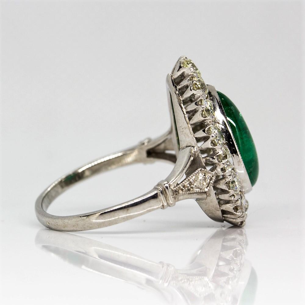 Art Deco Platinum Handmade Emerald and Diamonds Halo Ring For Sale