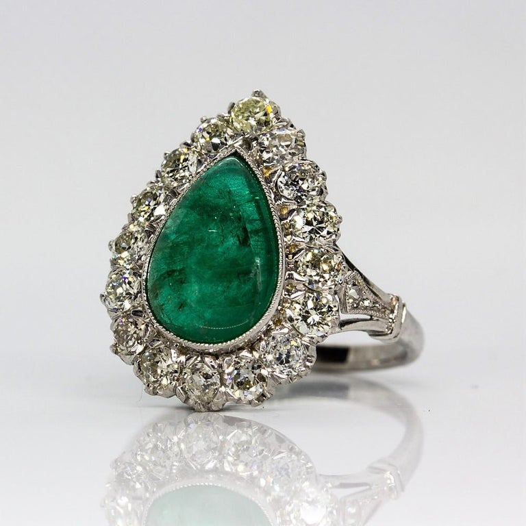 Platinum Handmade Emerald and Diamonds Halo Ring For Sale at 1stDibs