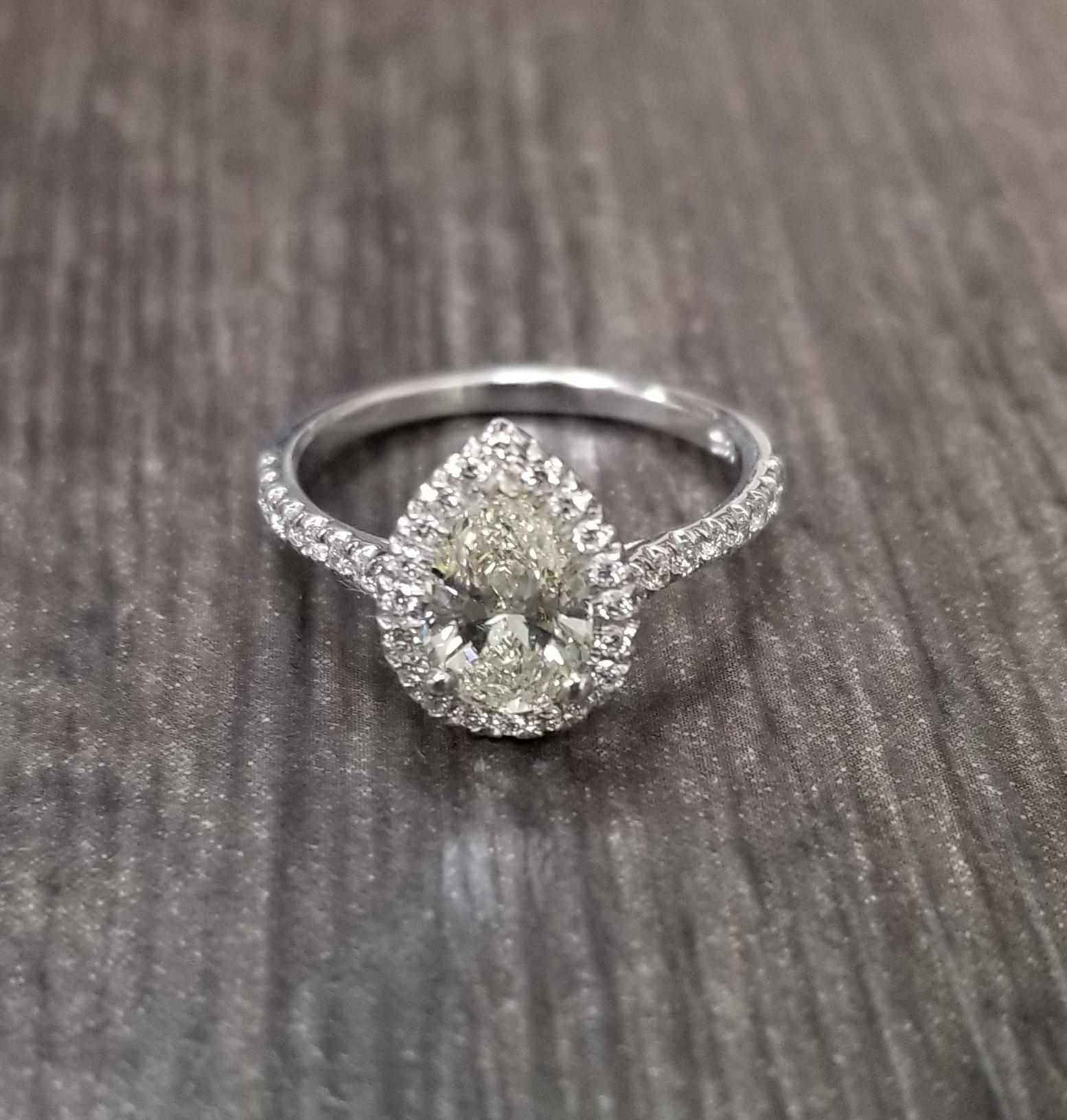 Contemporary 1.00 Carat Pear Shape Diamond with Diamond Halo