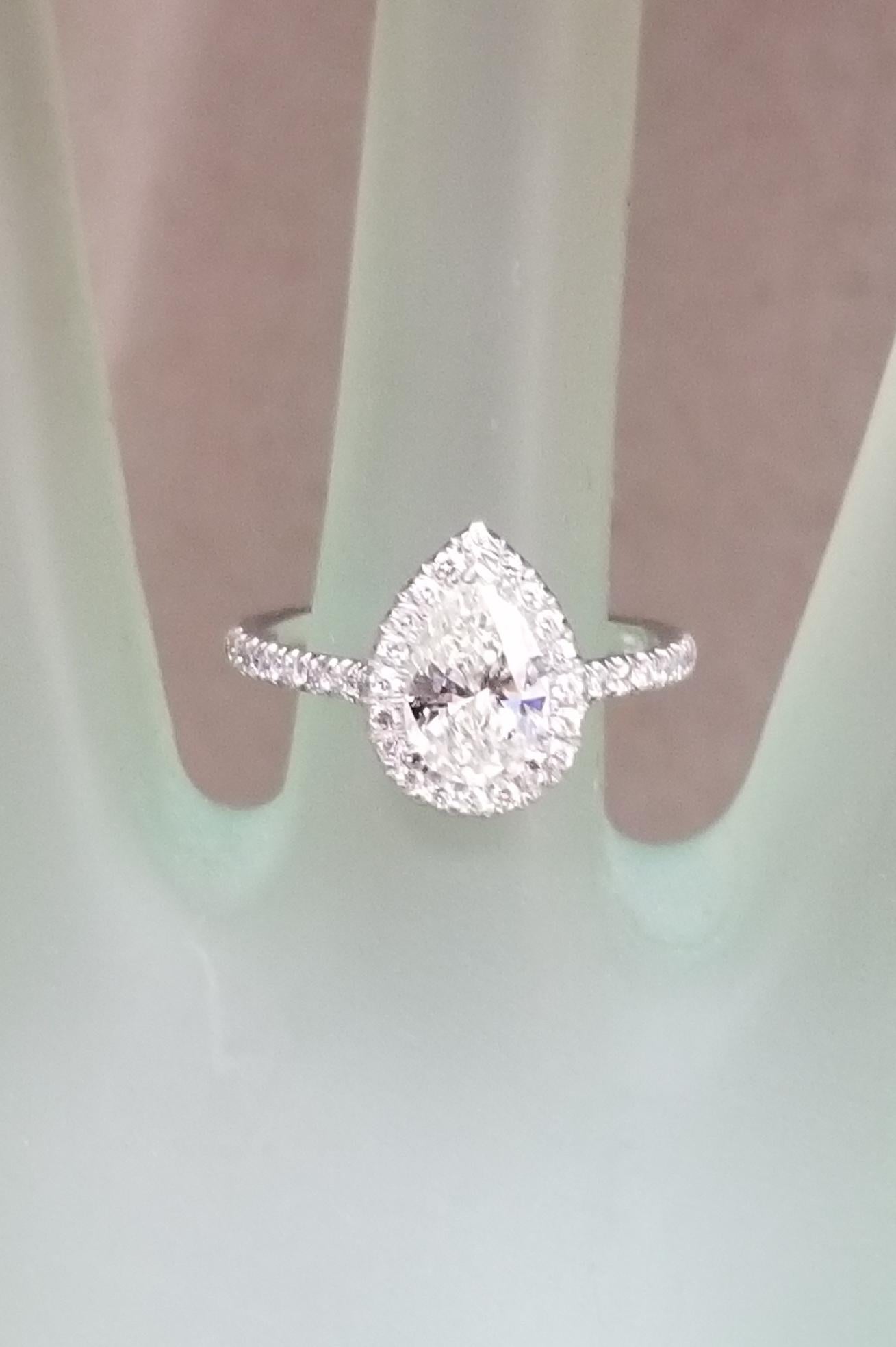 1.00 Carat Pear Shape Diamond with Diamond Halo 2