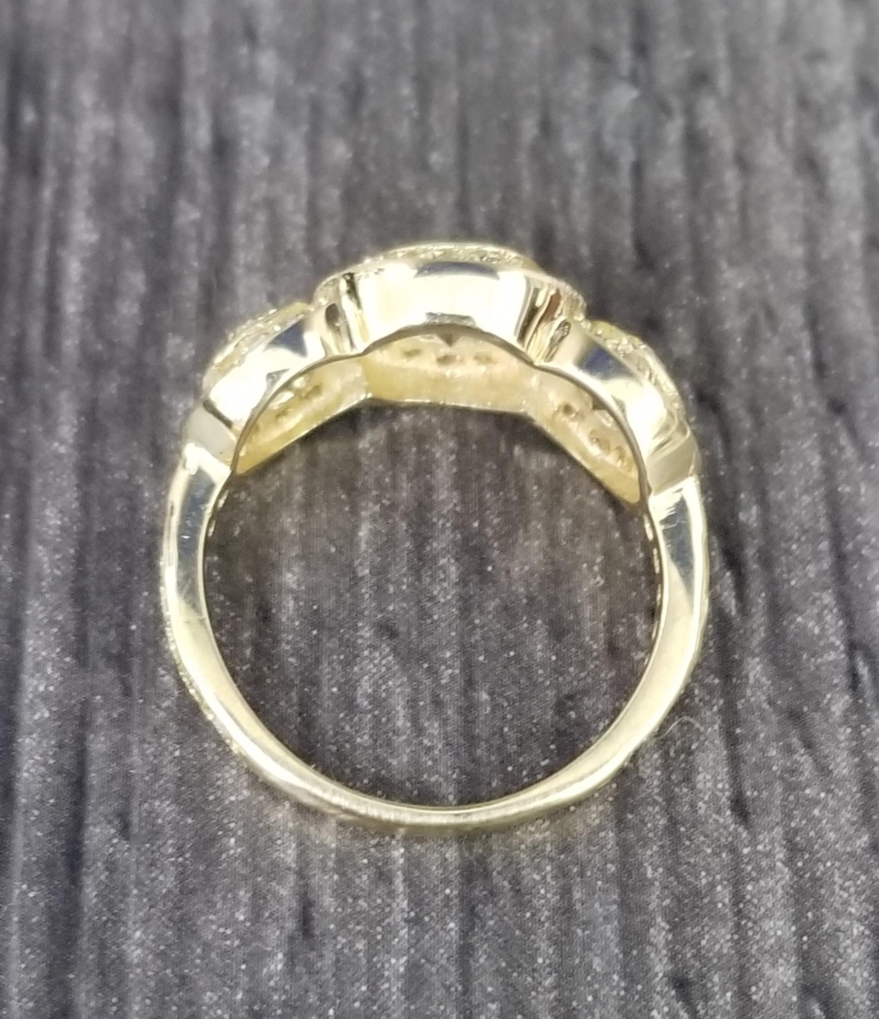 3 stone halo diamond engagement ring