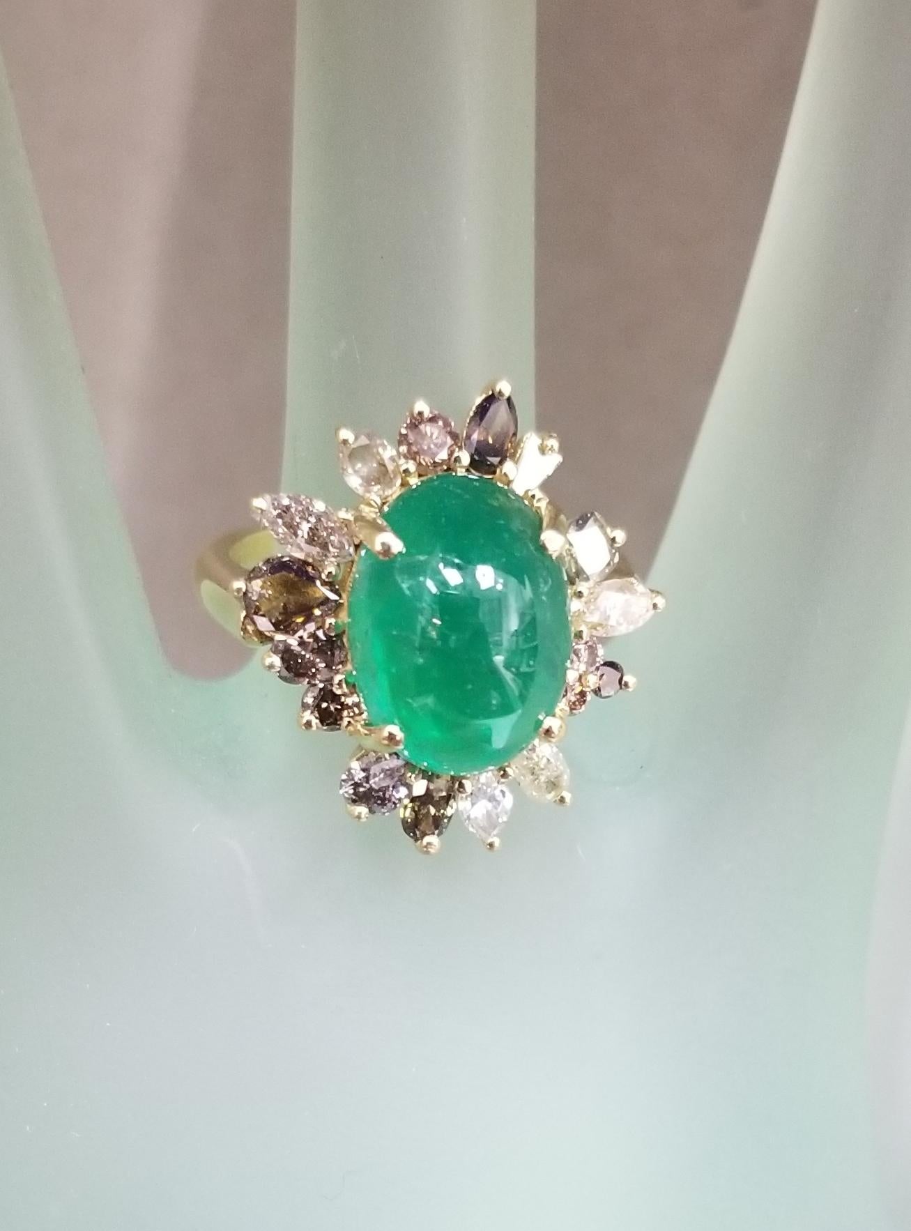 Natural White, Yellow and Brown Diamonds Surrounding a Emerald 2