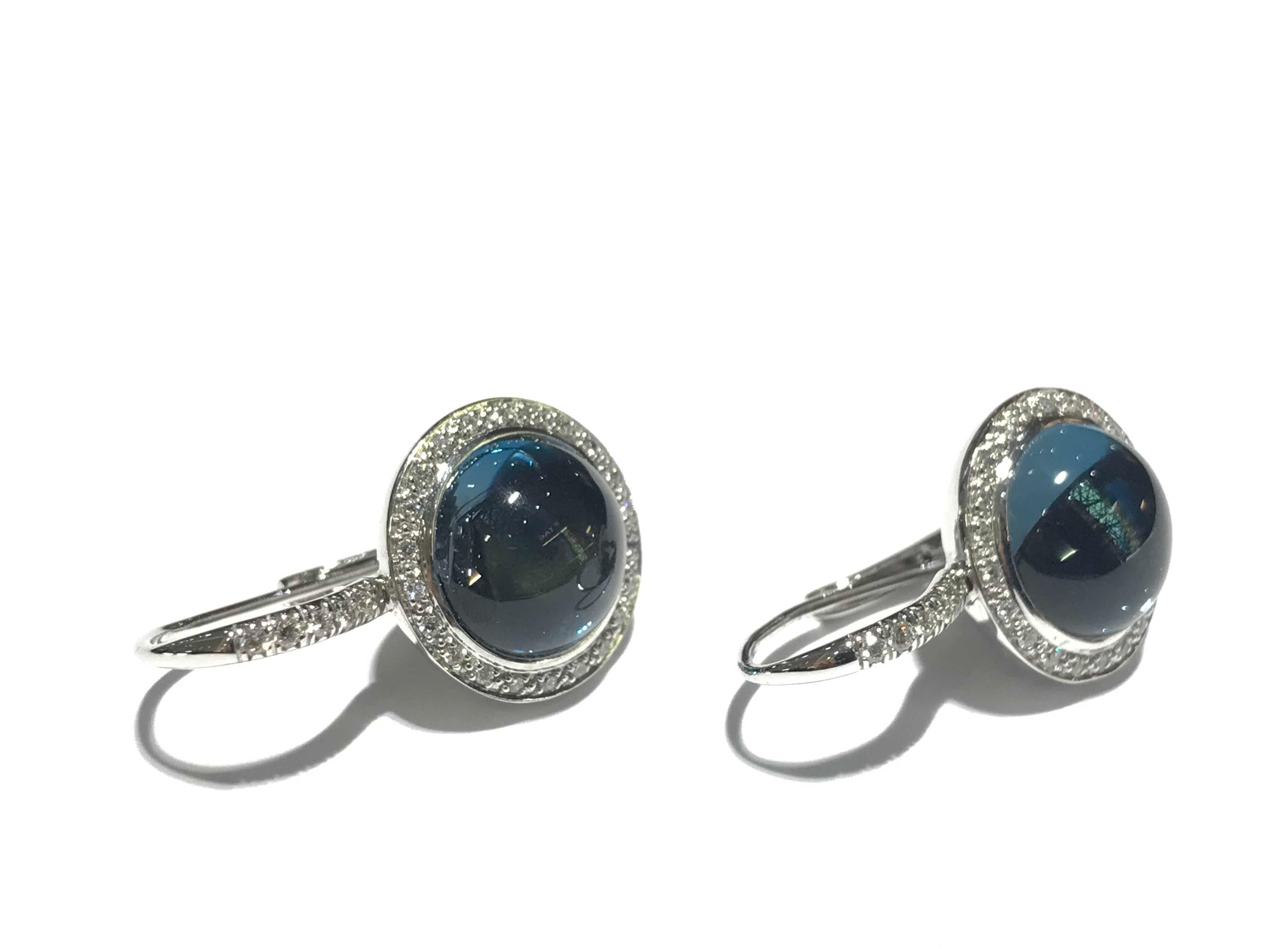 Mimi Shan Earrings in London Blue Topaz with diamond halo drop Earrings 
0.35 carat Daimonds in white colour 
VS clarity E F colour 