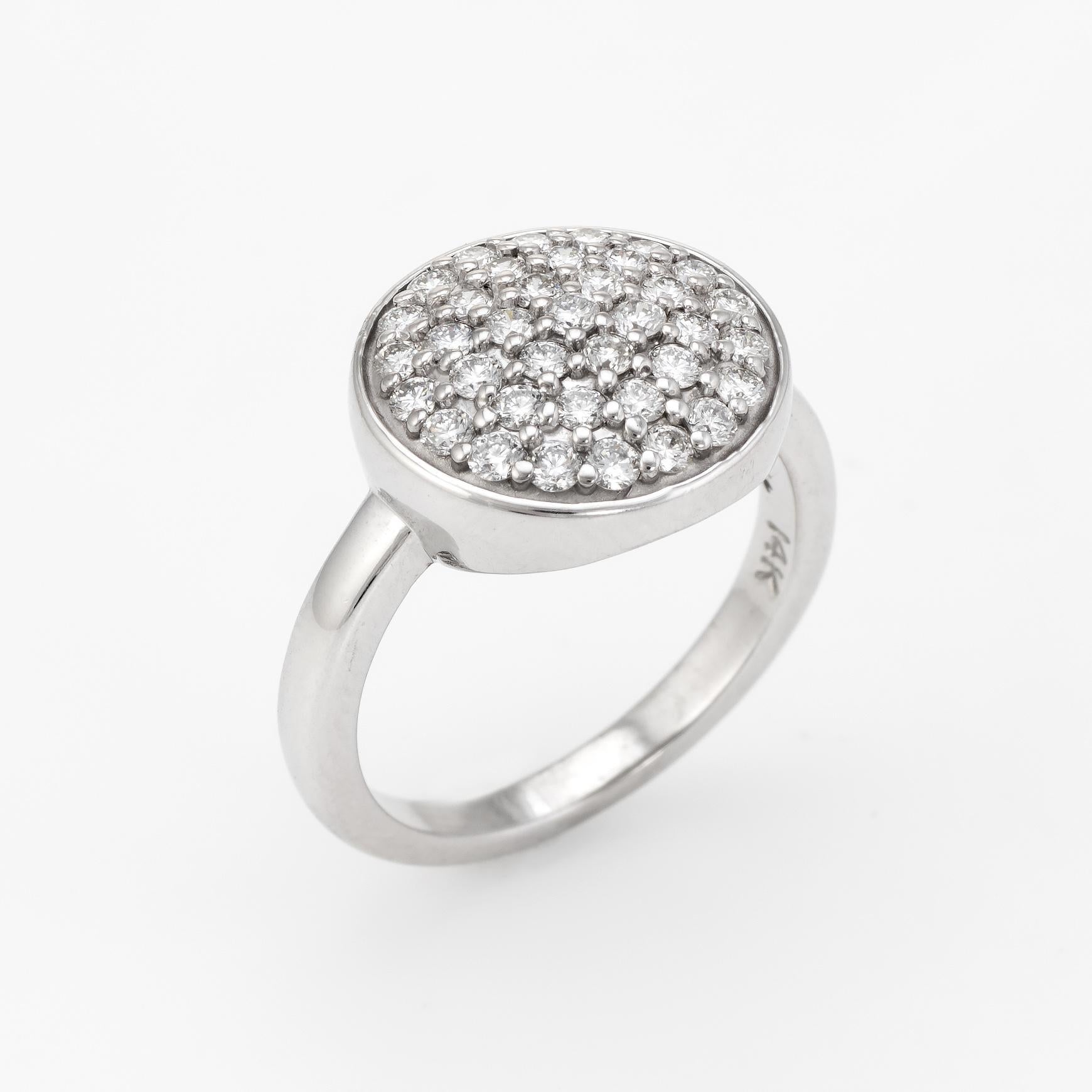 Elegant estate pave diamond cocktail ring, crafted in 14 karat white gold. 

A total of 35 approx. 0.02 carat round brilliant cut diamonds are set into the round mount. The total diamond weight is estimated at 0.70 carats (estimated at G-H color and