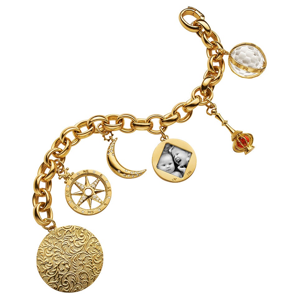 A Gold and Multi-Gem Charm Bracelet by Monica Rich Kosann For Sale