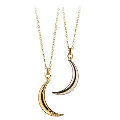 A Gold and Diamond Moon Charm Necklace by Monica Rich Kosann