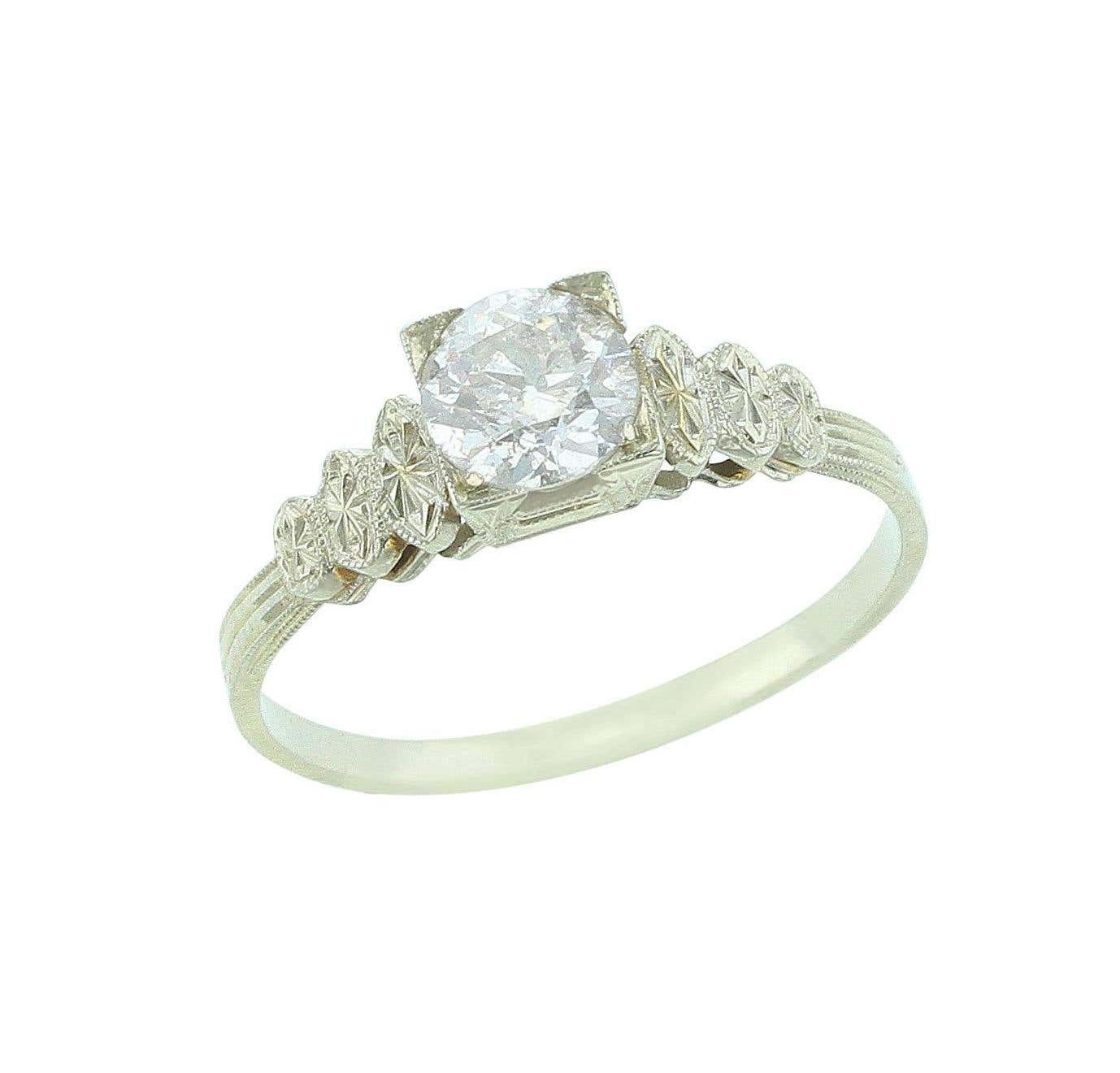 Solitaire Diamond Ring with Metal Ovals, 18 Karat White Gold In Good Condition In New York, NY