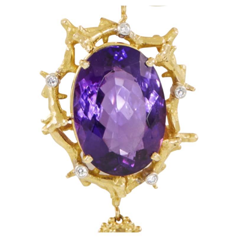 This is an extraordinary, one of a kind Siberian Amethyst at 28ct set in an 18ct yellow gold coral reef mount with 5 diamonds. The pendant is suspended on an 18ct yellow gold 16” Foxlink chain.

After an adventurous trip to Venezuela, Esther