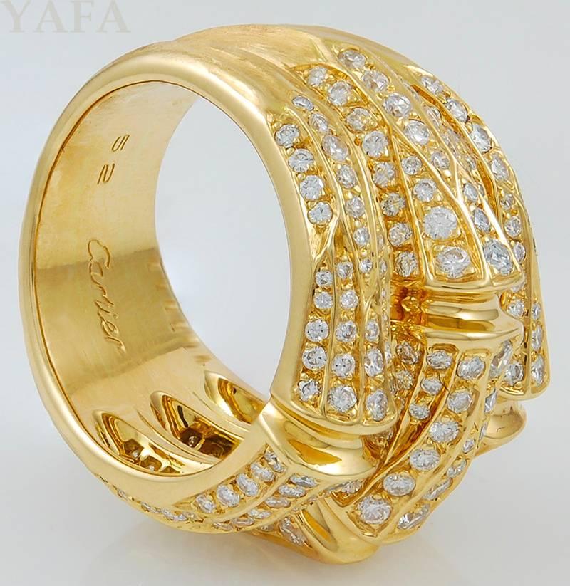 Designed as a triple band bamboo sections,  pavé-set with brilliant-cut diamonds, set in 18k yellow gold.  Signed Cartier.

Vintage and Estate Collection
