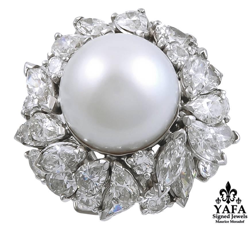 Platinum south sea pearl and marquise, pear-shaped and round diamond ring and ear clips.
ring- diamond weighing approx. 10cts., pearl 14.6mm and ring size 4
earrings - diamond weighing approx. 20cts., pearls 13.3mm
Circa 1970s