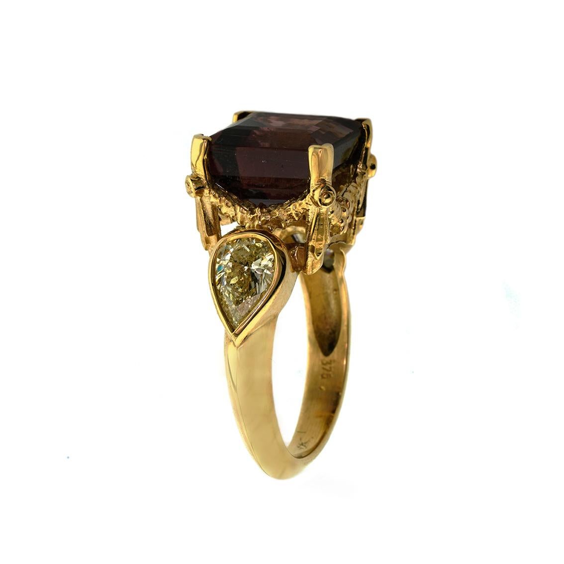 The Romantic Rites Ring is a stunning testament to love. 

Handmade in 9kt yellow gold this glorious ring features a divine, 11mm, square tourmaline.

The tourmaline is set in a signature William Llewellyn Griffiths garland setting and is flanked by