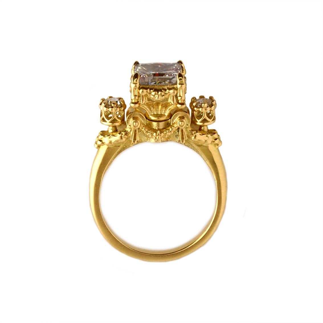 The Heavenly Infatuation Ring is luxurious, vibrant, and utterly breathtaking. This glorious ring transcends divinity and is truly remarkable. This ring is a modern take on intricate Victorian jewellery designs

Handmade in 18kt yellow gold, this