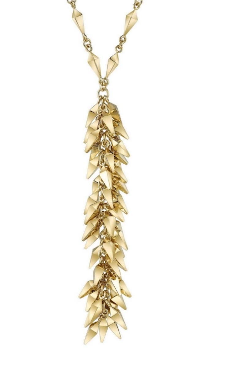 18 Karat Dancing Pyramid Lariat Necklace features Karma El Khalil's signature three dimensional pyramid linked chain with a lariat drop of multiple pyramid clusters set in solid 18k gold
18k Yellow Gold 
From Karma El Khalil's Rock Hall Collection