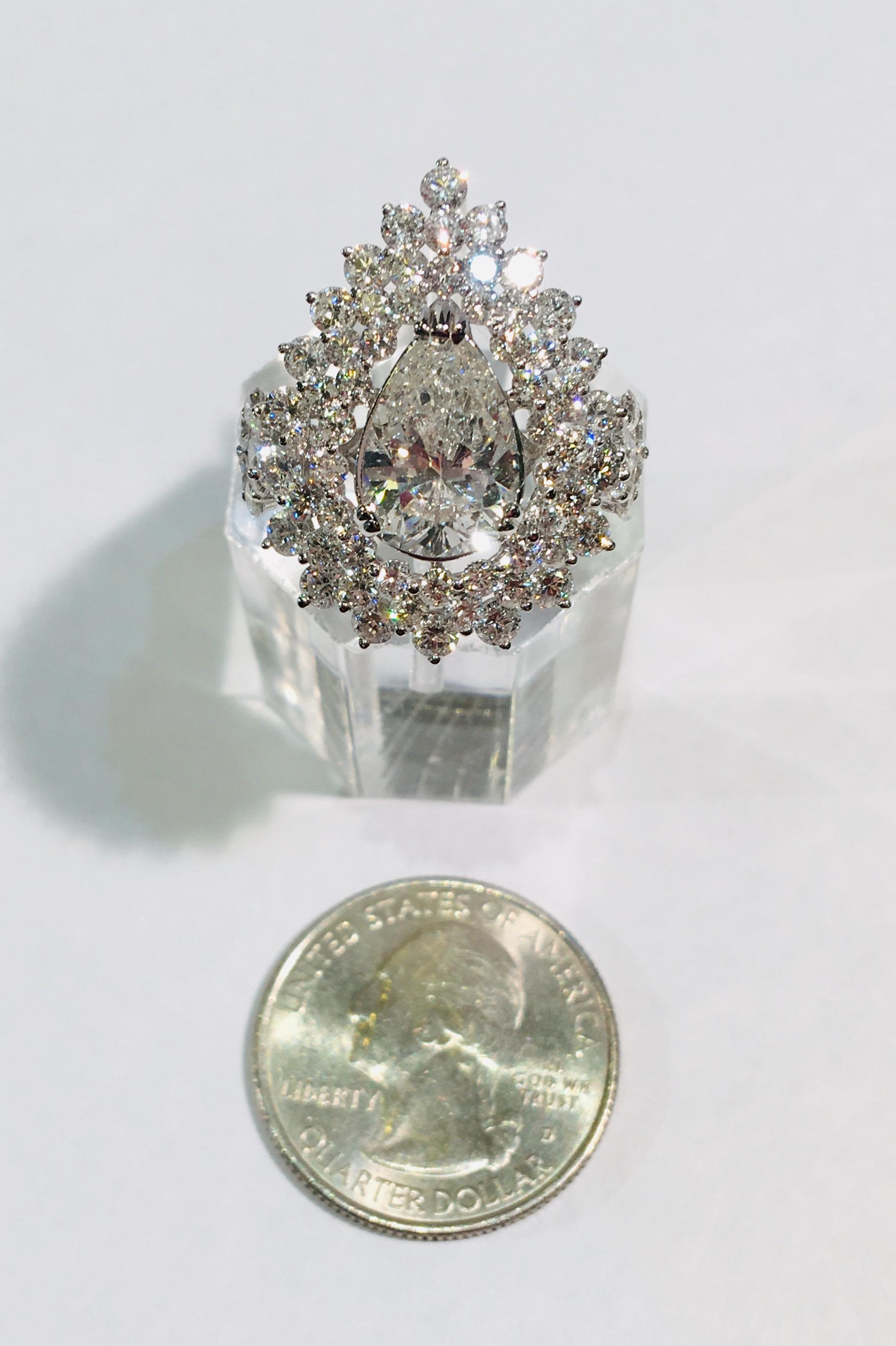 Dazzling 6.13 Carats F Color Diamond Ring with 2.63 Carat Pear Center 18 Karat 2