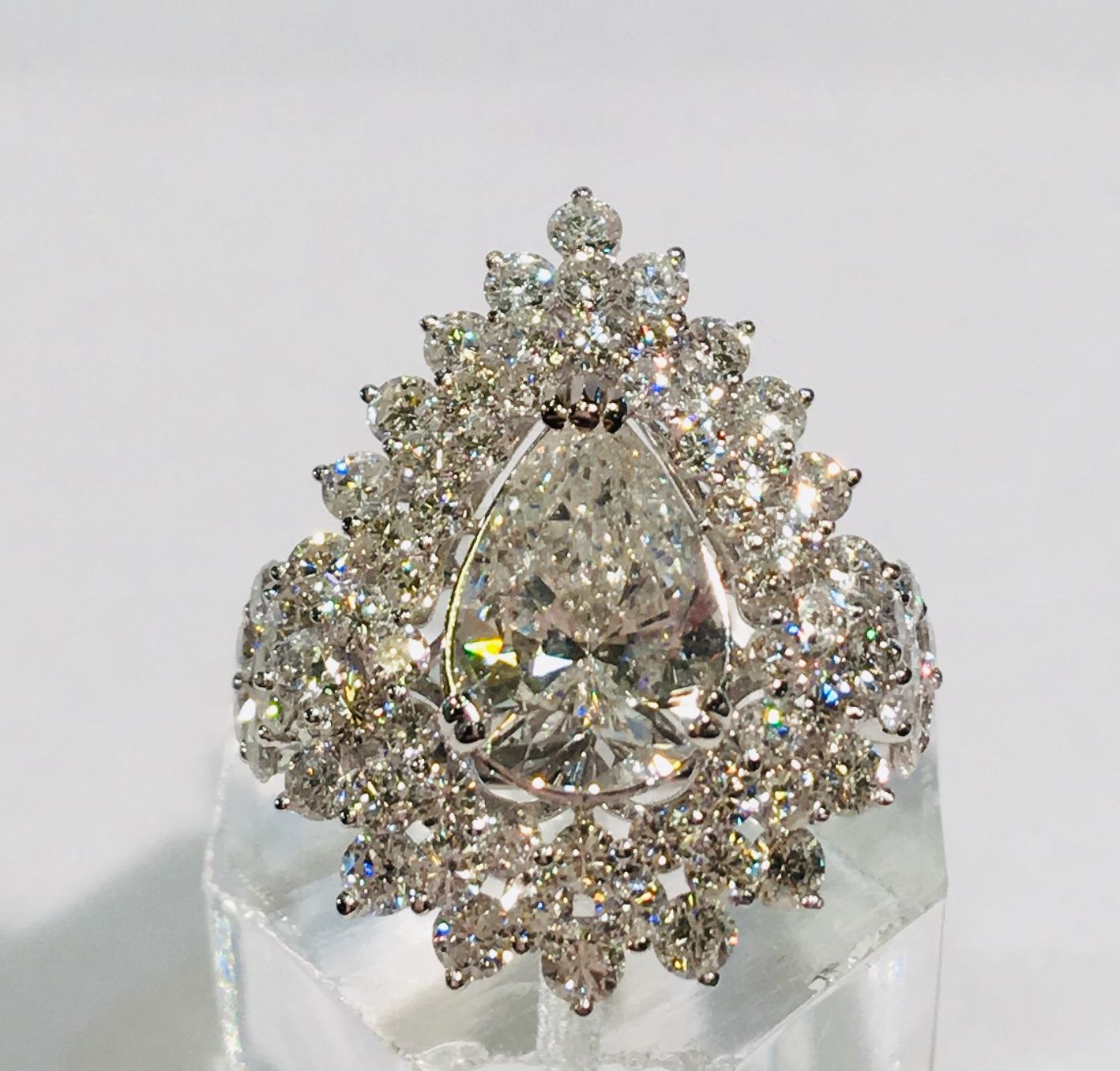 Women's Dazzling 6.13 Carats F Color Diamond Ring with 2.63 Carat Pear Center 18 Karat