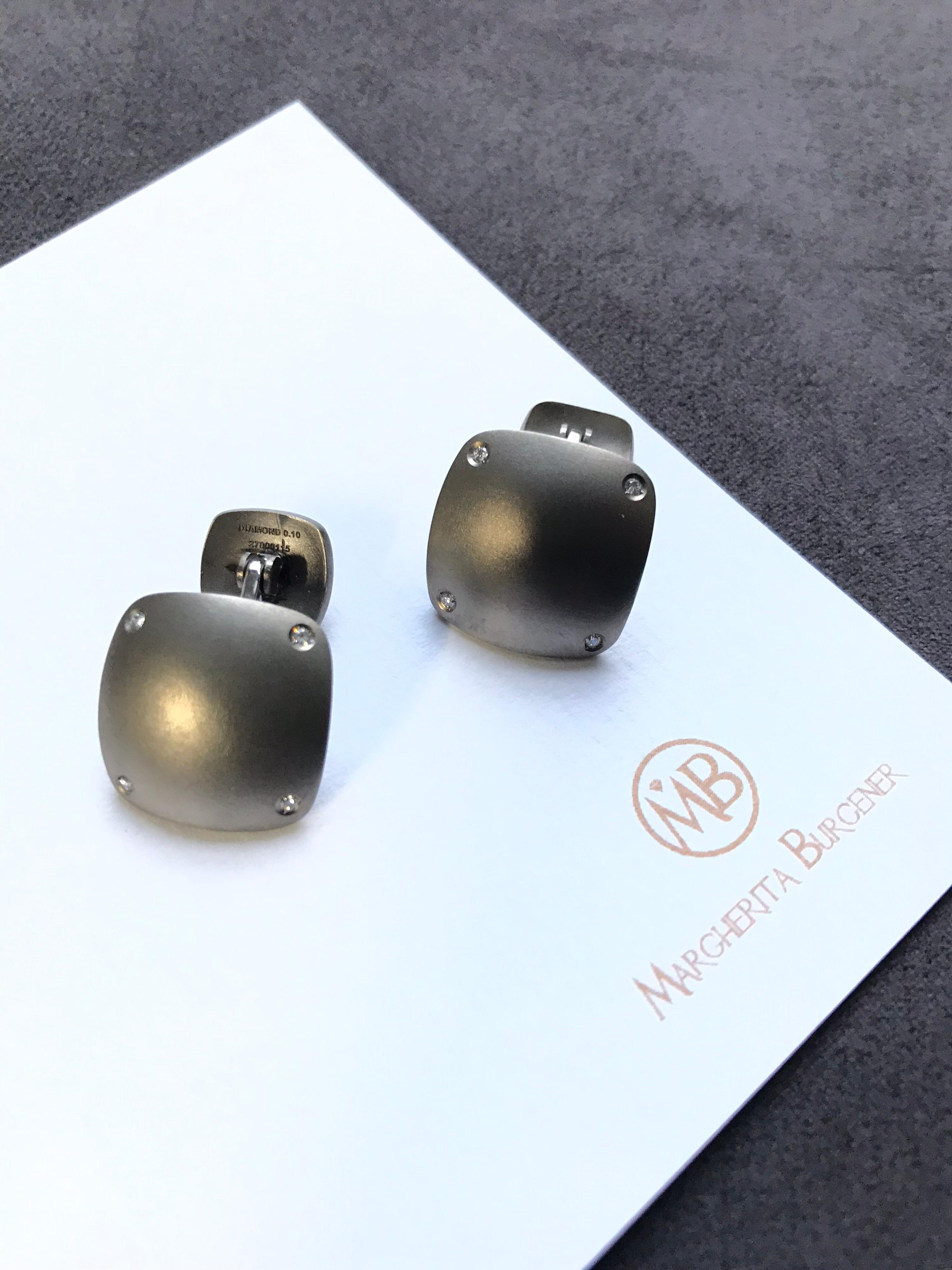 Modern yet classic cufflinks, handcrafted in titanium.
highlighted by 8 diamonds for total ct 0,09
18KT white gold total grams 1.30

They can be customized engraving two letters or a date, upon request. Please let us know your wish  and we will
