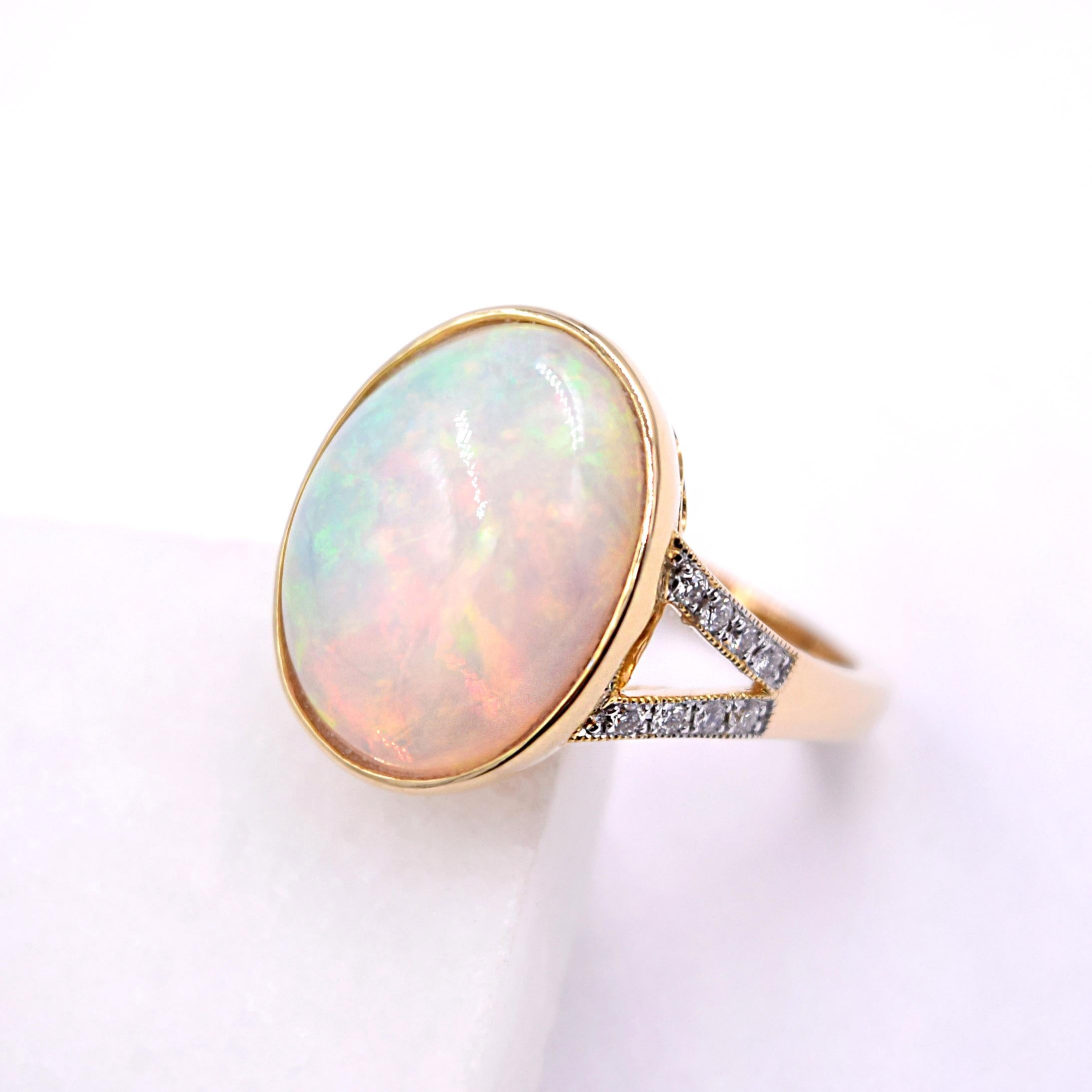 Oval Cut 8.09 Carat Ethiopian Opal and White Diamond Statement Ring in 14 Karat Gold For Sale