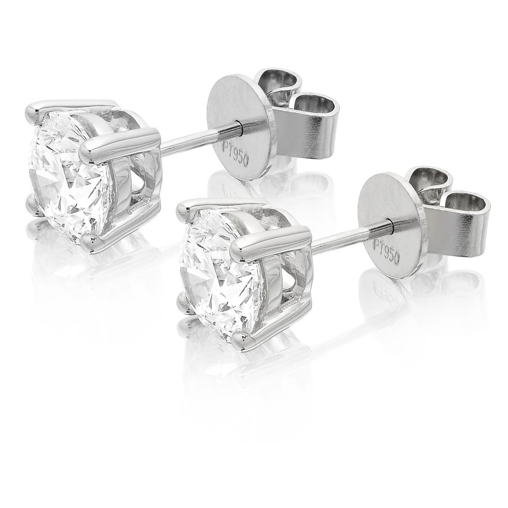 GIA Certified Solitaire Stud Diamond Earrings set in Platinum. Dazzling diamonds accentuate this classic earrings. 
Featuring 2 GIA graded round brilliant cut diamonds weighing 3.06 carats total weight set in platinum with pin and push on butterfly