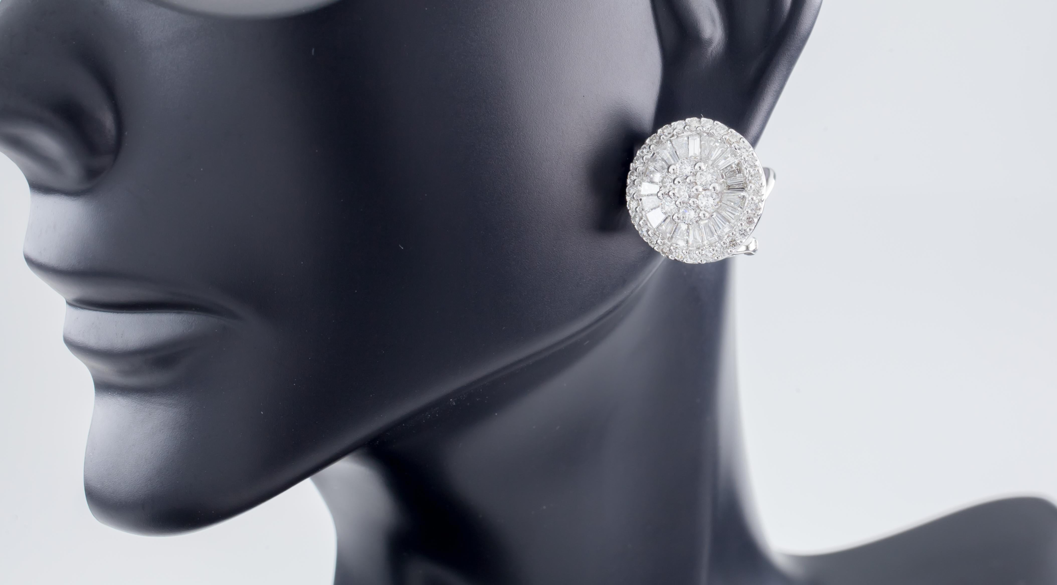 Feature Round Diamond Floret Surrounded by Invisible Set Baguette Ballerina and Round Diamond Bezel
Setting is approximately 19 mm in Diameter
Feature Stud Back with Omega Clasp
Total Diamond Weight = Appx 2.43 ct
Average Color = G
Average Clarity =