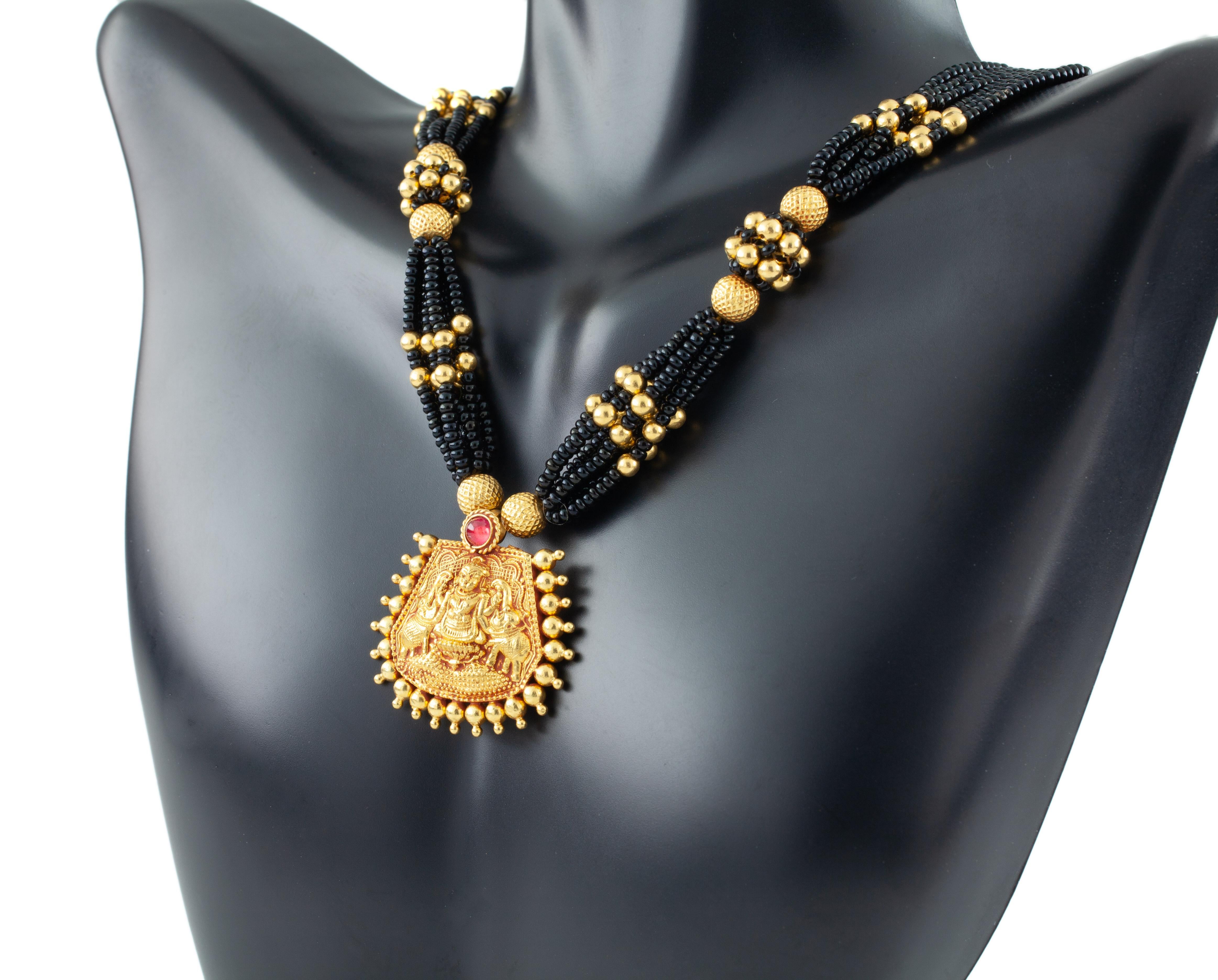 22 carat gold black bead necklace