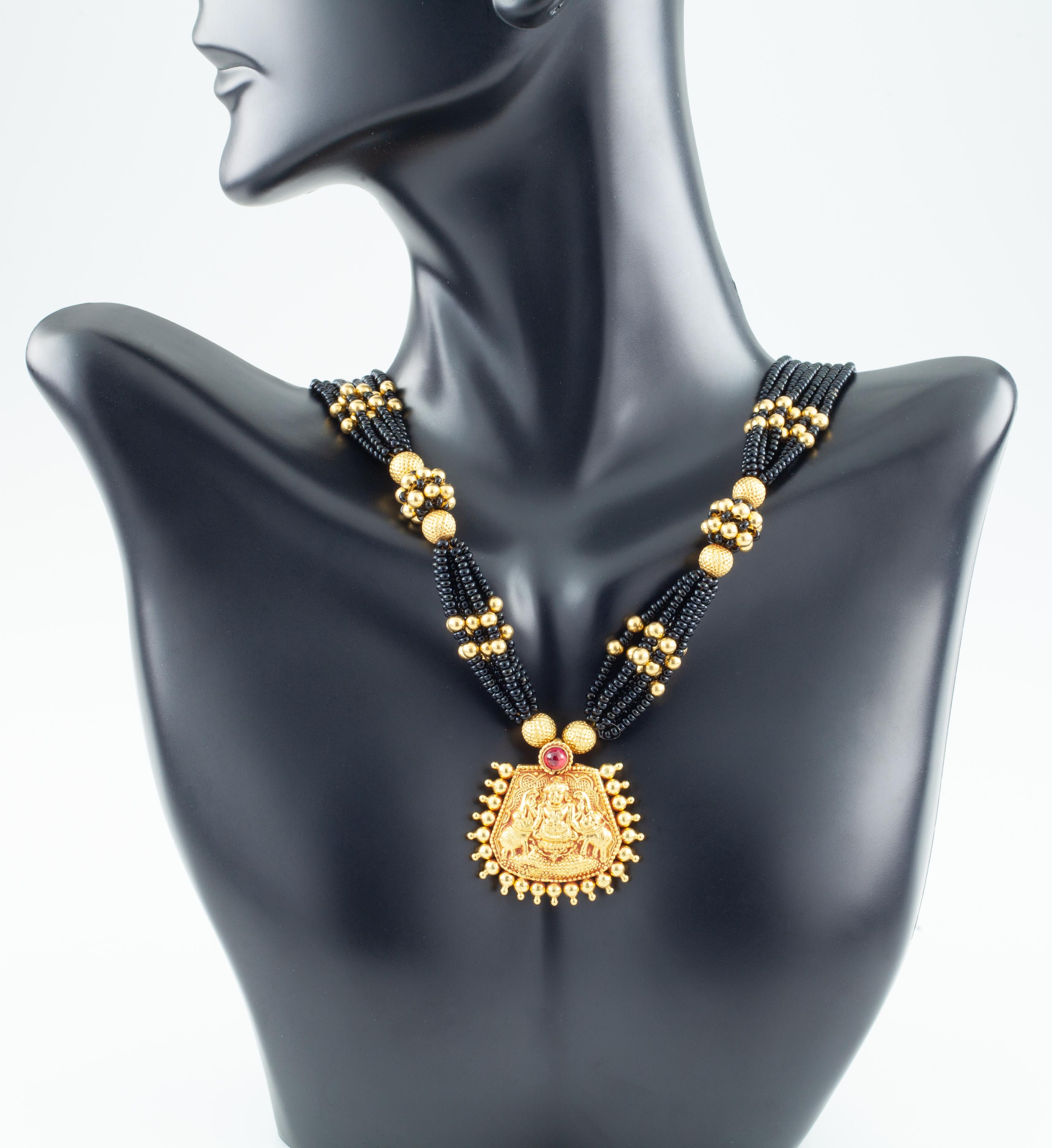 22 carat gold black bead necklace