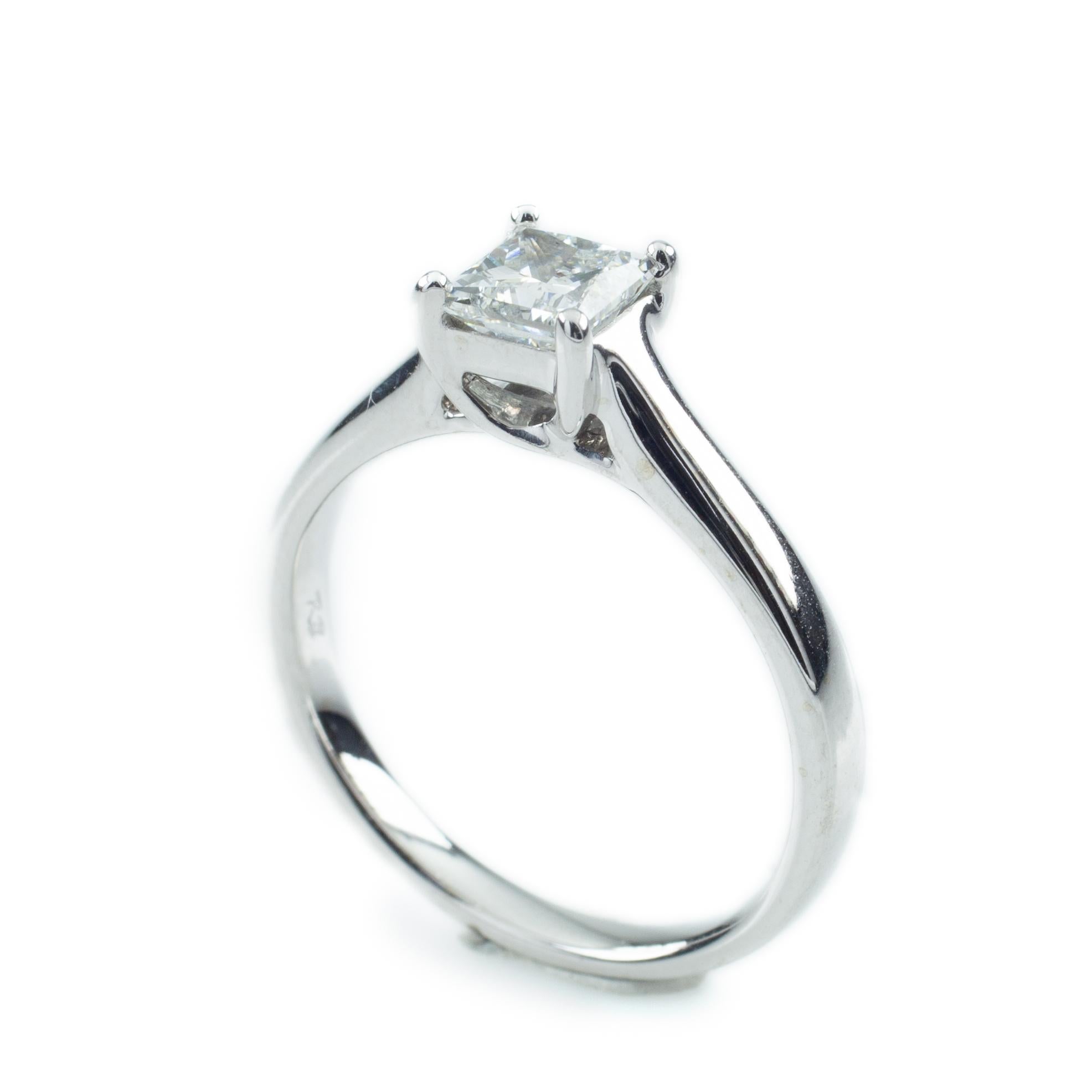 Gorgeous, Elegant Princess-Cut Solitaire Diamond Ring
14k White Gold Prong Setting
Size 7
Includes IGI Certificate, Which Reads: 
Description: Natural Diamond
Shape and Cut: Square Modified Brilliant
Measurements: 4.94 x 4.80 x 3.50 mm
Weight: 0.75