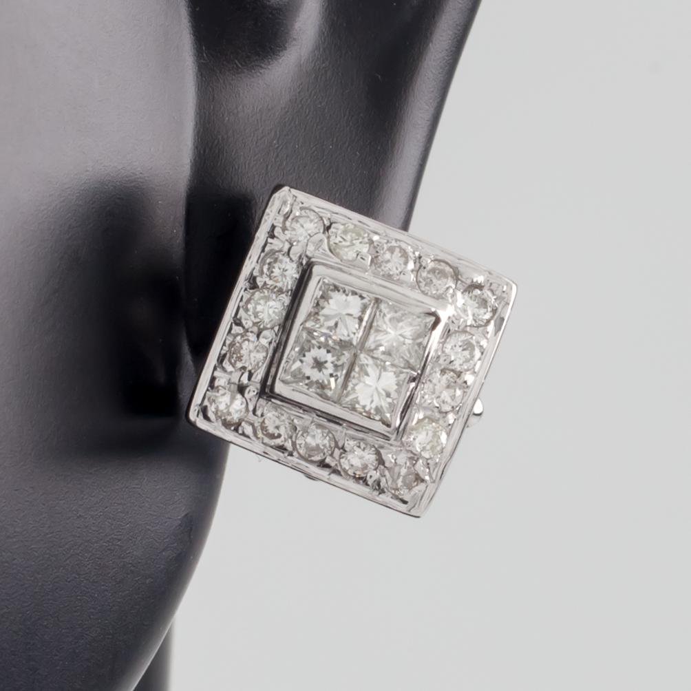 Each Earring features Four Invisible-Set Princess Cut Diamonds Surrounded by Pave Round Diamond Bezel
Studs w/ Omega Backs
Dimensions of Plaque = Approximately 1 cm x 1 cm
Total Mas = 8.0 grams