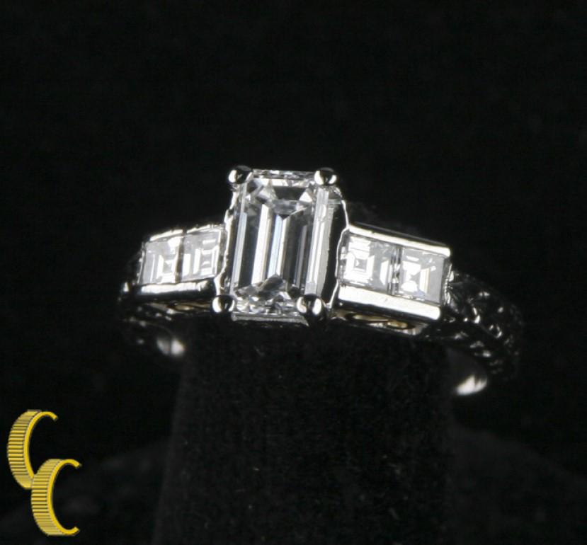 Gorgeous Platinum Engagement Ring w/ Solitaire Emerald Cut Diamond (GIA Certified) & Accent Stones
Platinum Band Accented by Delicate Design
Intricate Diamond Gallery Accented by Platinum and Gold Filigree
Size 5 1/8
Total Diamond Weight = 1.65