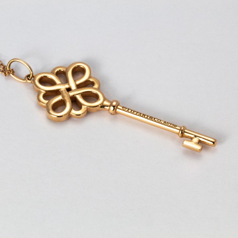 Tiffany and Co. Diamond 18 Karat Rose Gold Knot Key Pendant Necklace at