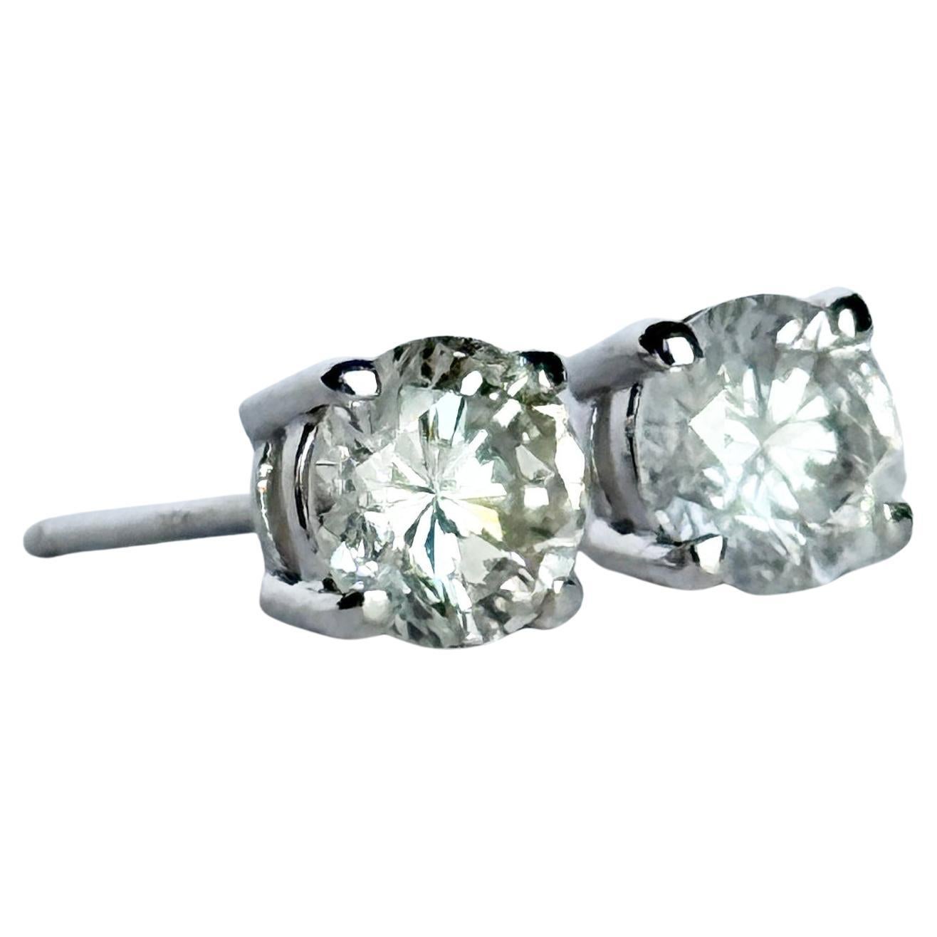 Boucles d'oreilles en or blanc 18 carats et diamants