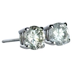 Boucles d'oreilles en or blanc 18 carats et diamants