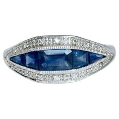 Modern 9 Carat White Gold Sapphire and Diamond Ring