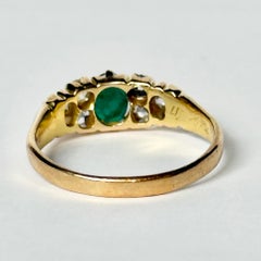 Bague édouardienne à trois pierres en or 18 carats avec émeraude et diamants
