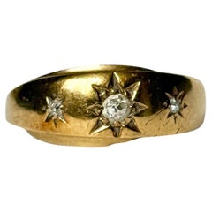 Edwardian Diamond and 18 Carat Gold Three Stone Star Setting Ring