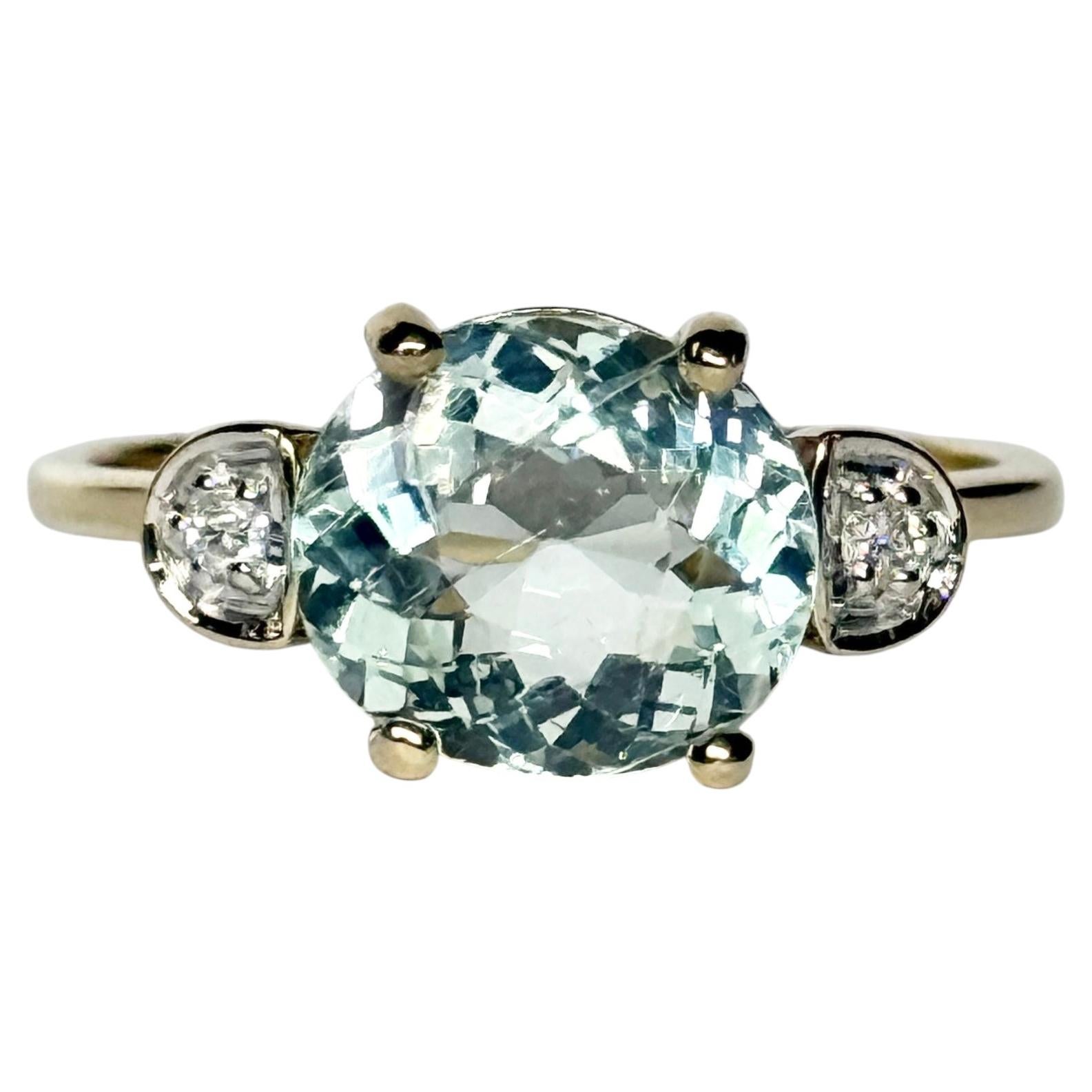 Bague solitaire vintage en or 9 carats avec aigue-marine et diamant