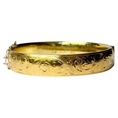Brazalete de oro grabado enrollado vintage