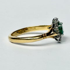 Anello a pannello con smeraldo e diamanti d'epoca in oro 18 carati