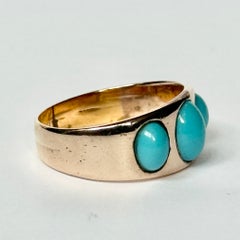 Art Deco Turquoise and 9 Carat Gold Three-Stone Gypsy Ring